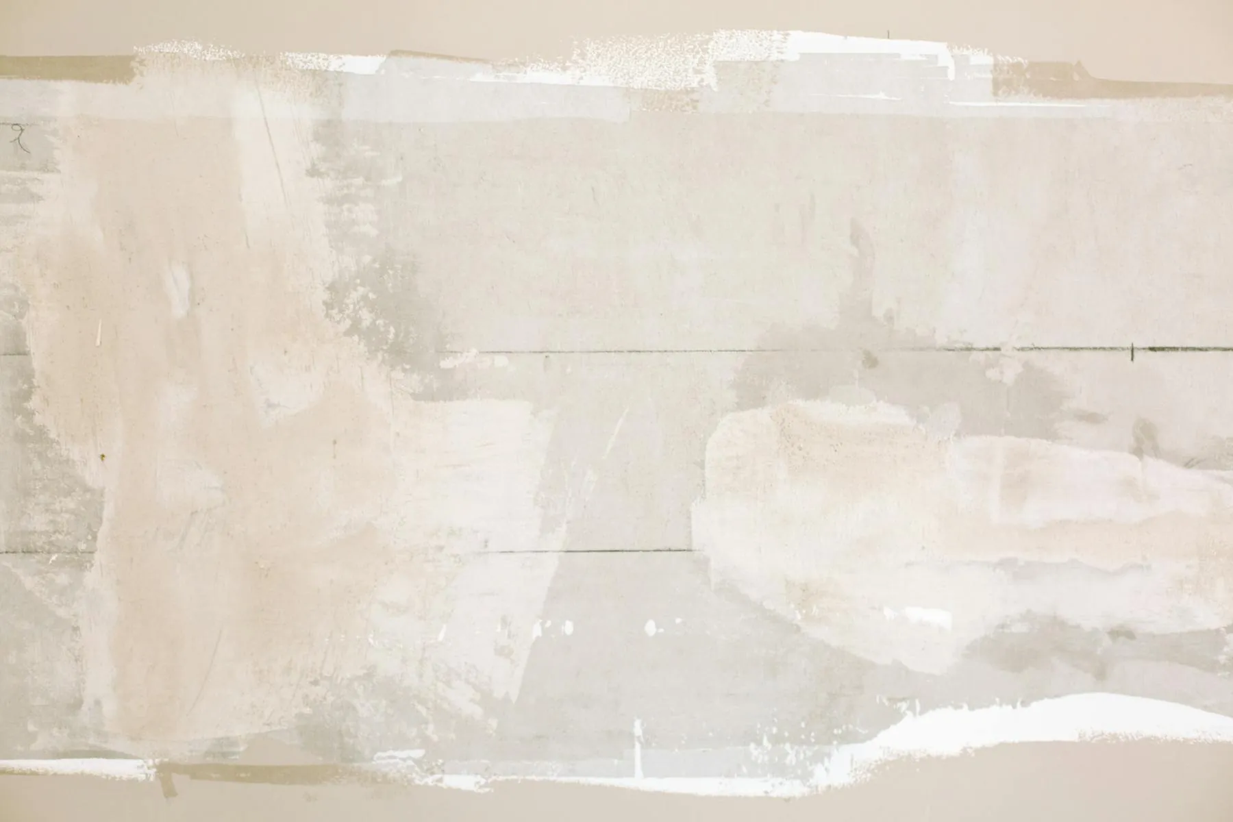 Perfectly patched drywall section sanded smooth and ready for primer.